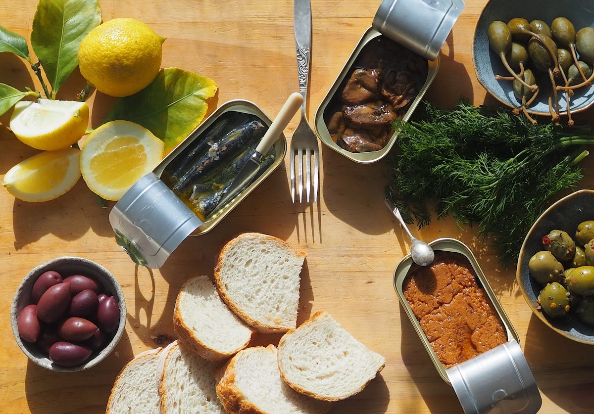 - CERES Fair Food Little Tin - the tinned seafood range open on a table